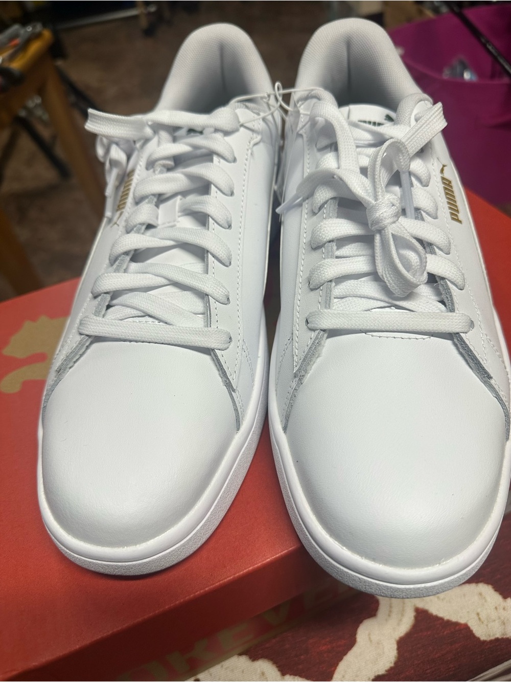 Puma White Low-Top Sneakers with Gold Logo